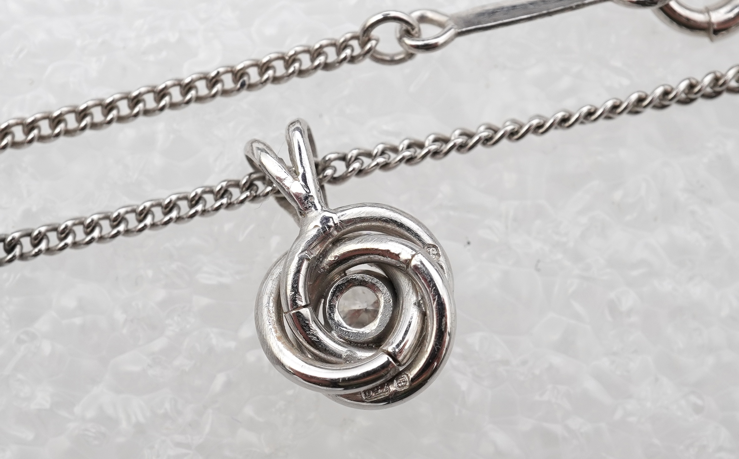 A diamond pendant necklace